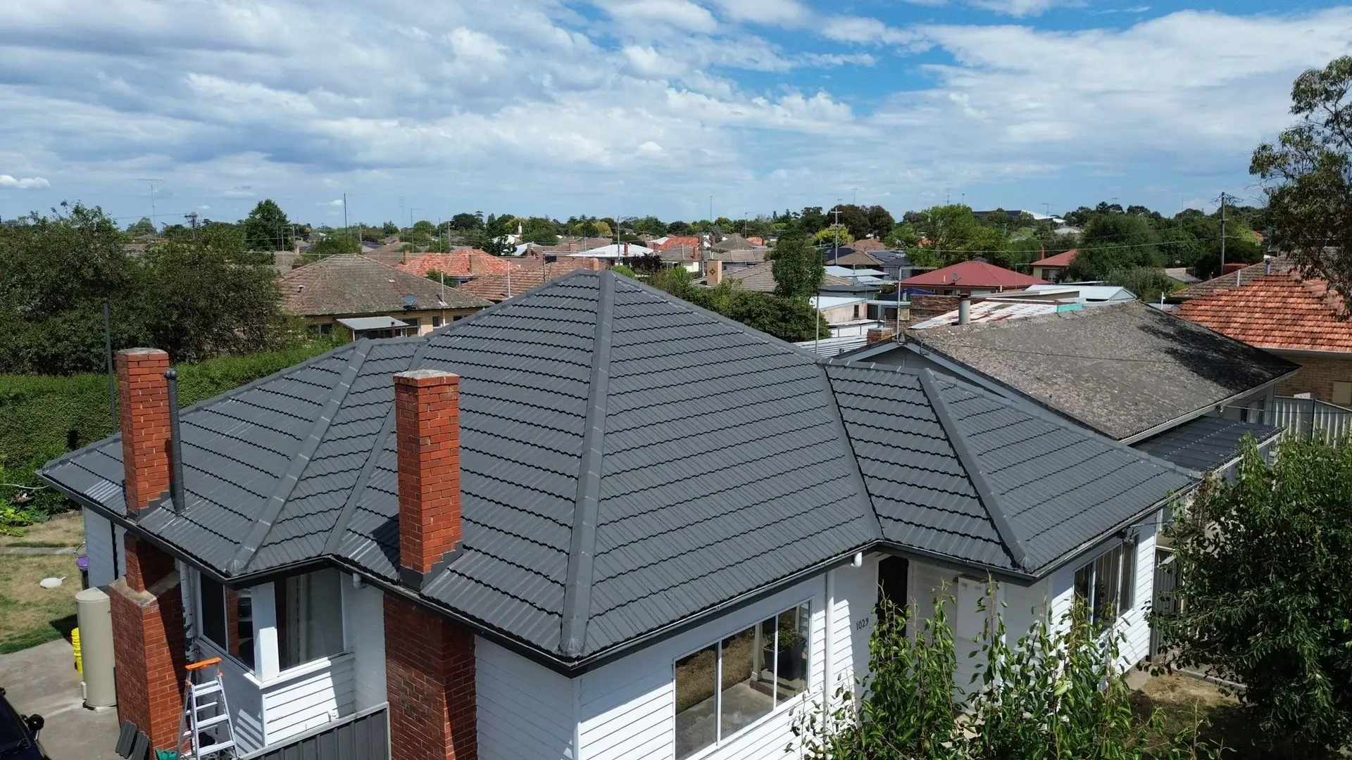 New-Dark-Grey-Roof-Featuring-Modern-Drainage-1920w New Dark Grey Roof Featuring Modern Drainage